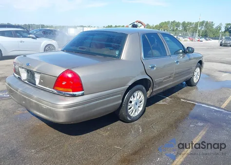 2003 Ford Crown Victoria Lx z USA, uszkodzony, nr VIN 2FAHP74W03X182686